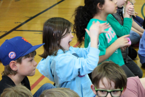  Student enthusiastically clapping